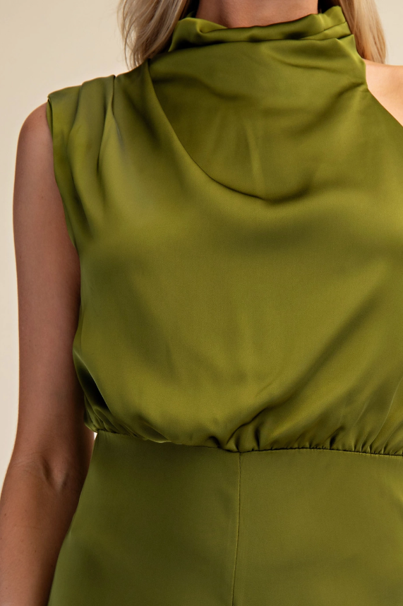 Green sleeveless dress with a hood on a neutral background
